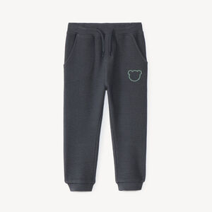 Pantalón de chándal para bebé niño con tejido de panal y estampado de oso. 