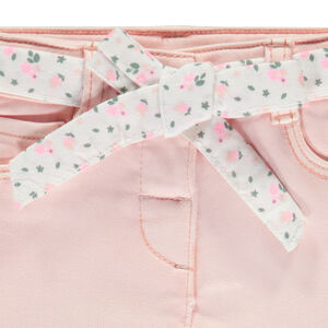 Jean recto con cinturilla de flores para atar para niña. 