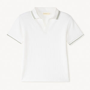 Polo de manga corta de punto liso para niño. 