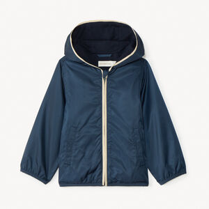 Cortavientos liso forrado en jersey para niño. 