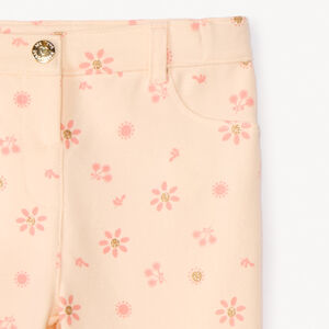 Pantalón con estampado de flores brillantes niña bebé. 