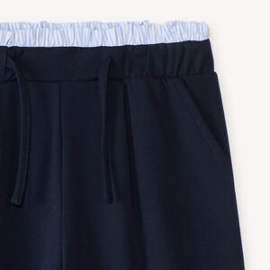 Pantalón de niña ancho de franela con detalle en la cintura. 
