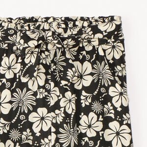 Pantalón fluido con estampado de flores exóticas y cinturón anudado niña 