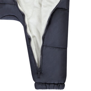 Buzo repelente y forrado para bebé niño con acabados diferentes según la edad 