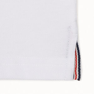 Polo de algodón de manga corta en color liso para niño 