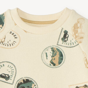 Sudadera de manga larga de felpa con estampado de sellos para niño. 