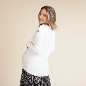 Jersey liso de punto con botones joya para mujer 