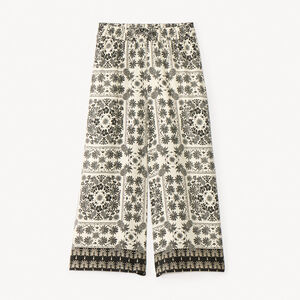 Pantalón amplio fluido con estampado fantasía para niña 