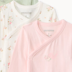 Lote de 7 bodies de manga larga fantasía para bebé niña con aperturas diferentes según la edad 