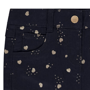 Pantalón slim estampado corazones dorados para bebé niña 
