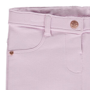 Jeggings lisos con botón grabado 