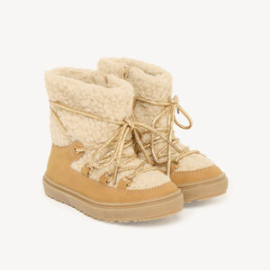 Bota de niña con cordones y cremallera de borreguito. 