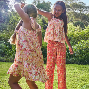 Pantalón fluido con estampado floral y detalle torsadado para niña 