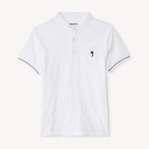 Polo de manga corta con cuello mao y bordado de palmera para niño. 
