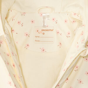 Parka de goma con capucha y estampado de flores para niña. 