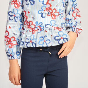 Legging canalé liso con cordón de pompones niña 