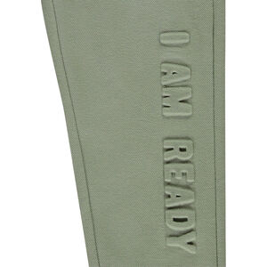 Pantalón de jogging liso con escritura en relieve niño 