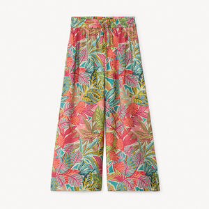 Pantalón amplio y fluido con estampado fantasía para niña. 