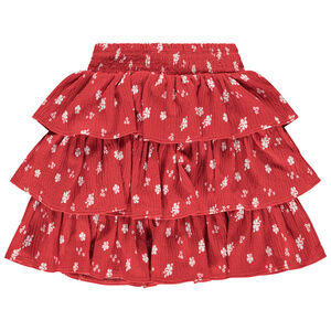 Falda corta de punto calado y estampado con volantes para niña 