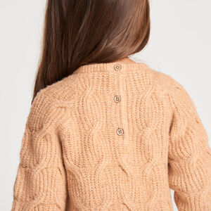 Ropa de bebé niña de punto trenzado con lazos. 