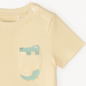 Camiseta de manga corta de punto con bolsillo divertido para bebé niño. 