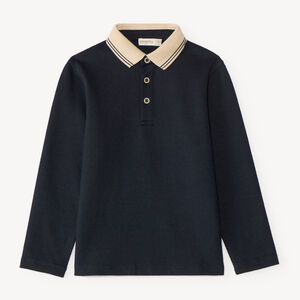 Polo de manga larga para niño con cuello contrastante y original. 