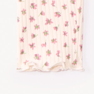 Pantalón largo de punto acanalado con estampado fantasía niña 