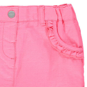 pantalon corto rose en maille y bolsillos con volantes 