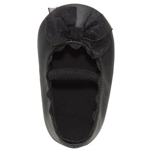 Merceditas negras con goma y lazo de tul 