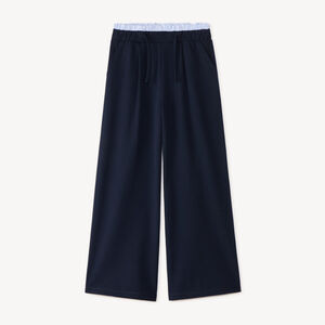 Pantalón de niña ancho de franela con detalle en la cintura. 