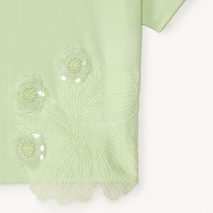 Camiseta de manga corta con grandes flores de lentejuelas niña. 