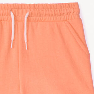 Pantalón corto de punto en color liso niña 