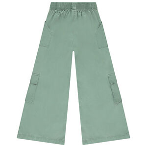 Pantalón acampanado uni verde en tela con bolsillos niña 