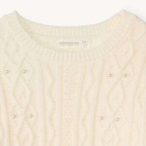 Suéter oversize de punto trenzado con perlas niña. 