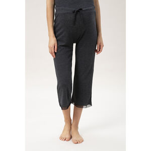 Pantalón pantacourt de punto jaspeado con detalles de tul 