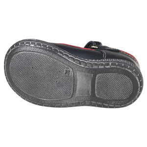 Babies noires et rouges en cuir avec patchs fleur et rivets 