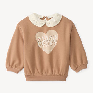 Sudadera niña oversized con cuello Peter Pan desmontable y estampado divertido. 