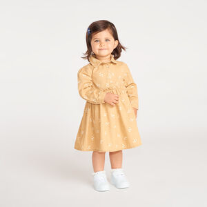 Vestido de bebé niña de manga larga con cuello camisol. 