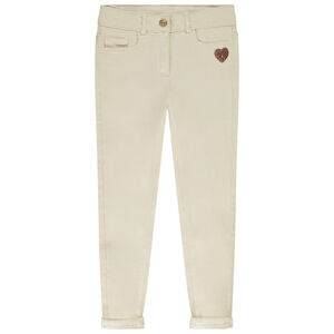 Jean slim con motivo de corazón en lentejuelas para niña 