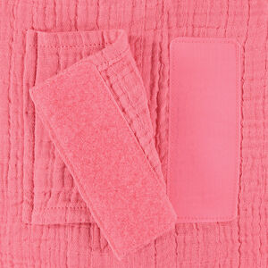 Cojín decorativo redondo en gasa de algodón modulable en protector de cuna o parque 