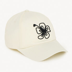 Gorra unicolor con flores de tiaré y cordones para niña 