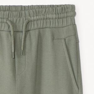 Jogging de piqué liso con motivo en relieve niño 
