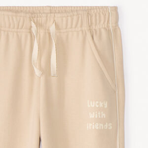 Pantalón jogger de felpa con estampado niña. 