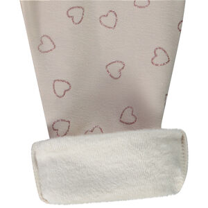 Jogging de bebé niña con estampado de corazones brillantes 