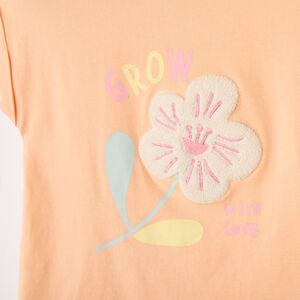 Camiseta de manga corta con parche de flor de bucle para niña bebé. 