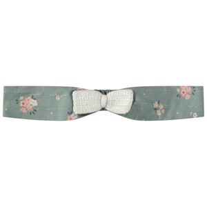 Diadema de punto con nudo y hilos de lúrex para bebé niña 