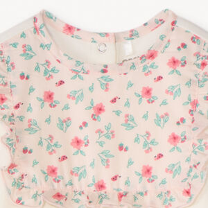 Pijama de interlock con pechera de flores niña bebé 