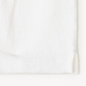 Polo de manga corta de punto liso para niño. 