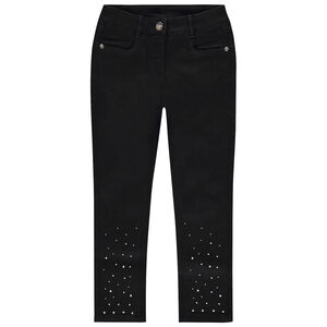 Jeans slim con strass en la parte inferior niña 