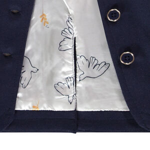 Chaqueta felpa detalles dorados 